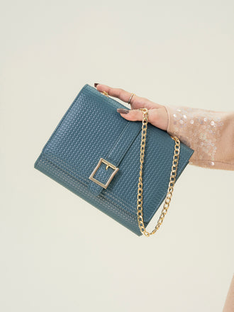 snake-patterned-clutch