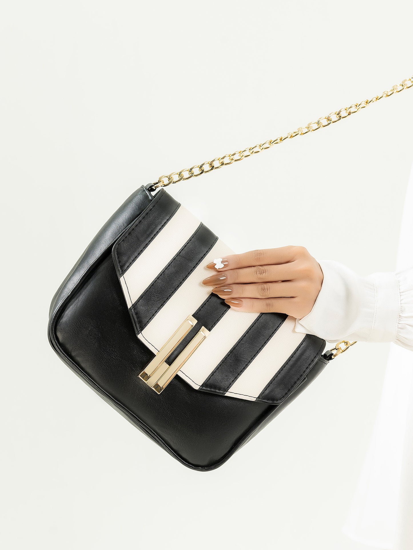 Striped Saddle Handbag