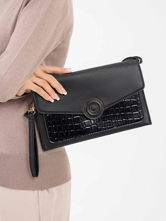 snake-textured-clutch