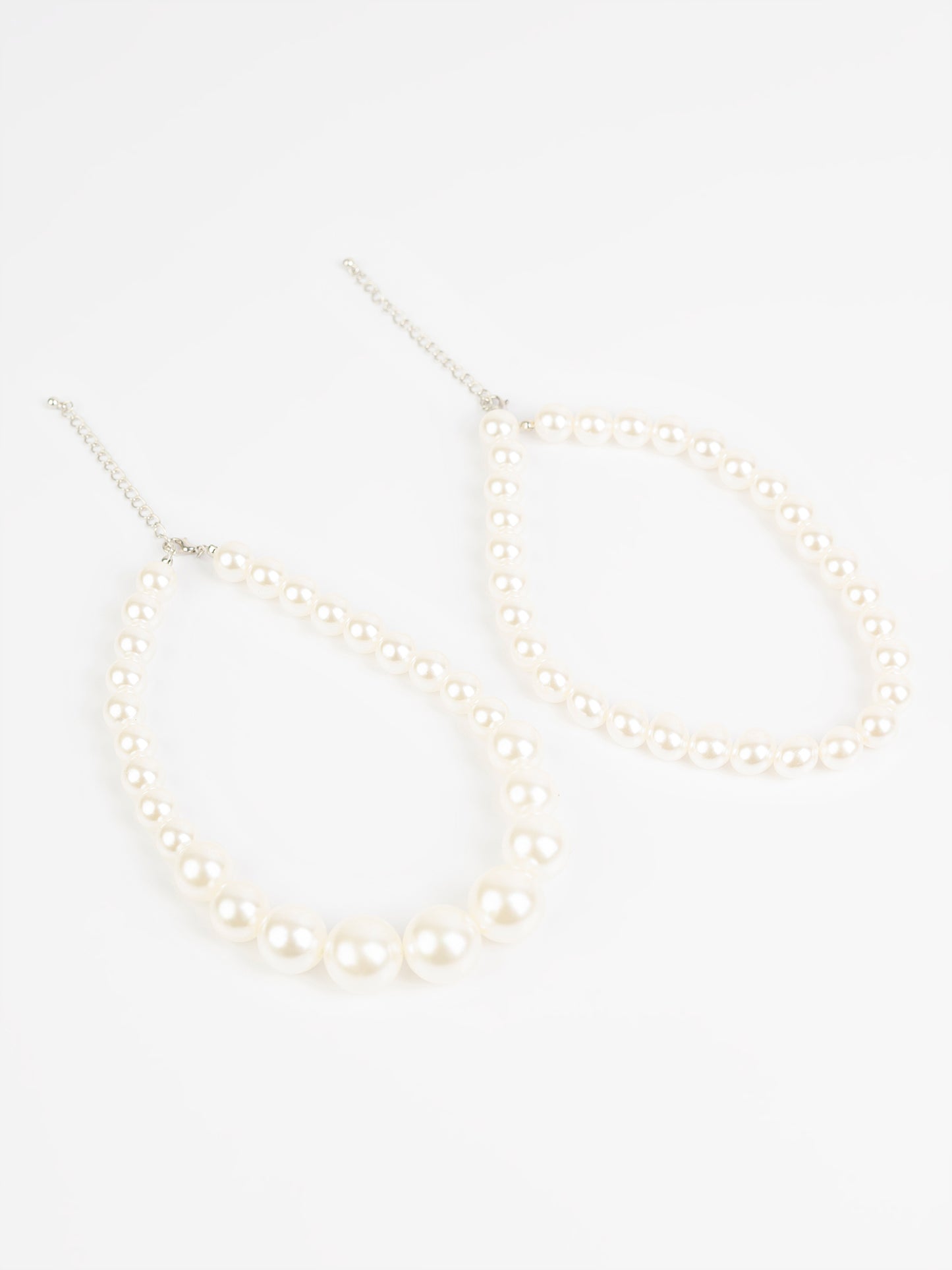 Two Pearl Necklaces