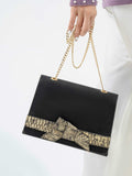 snake-textured-clutch