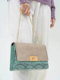 snake-textured-flap-handbag