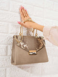 snake-printed-flap-handbag