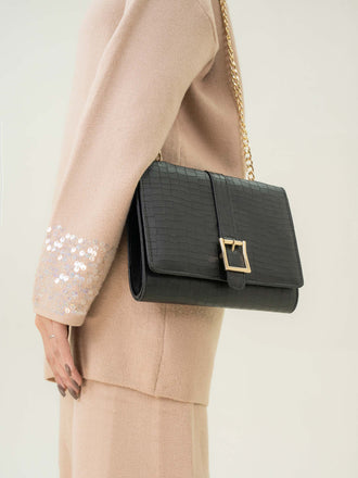 snake-patterned-clutch