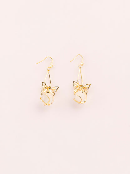 Dangling Caged Pearl Earrings