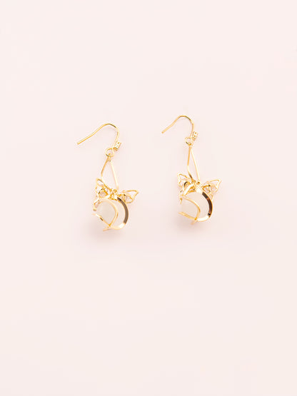 Dangling Caged Pearl Earrings