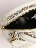 textured-pearl-circular-handbag